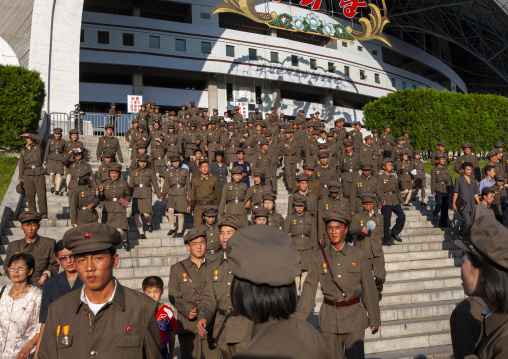 Soldiers coming out of the may day stadium after the Arirang mass games, DGC, Pyongyang, North Korea