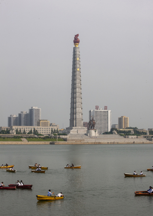 Rowing boats in front of Juche tower, DGC, Pyongyang, North Korea