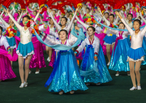Women dancing in choson-ot during the Arirang mass games, DGC, Pyongyang, North Korea