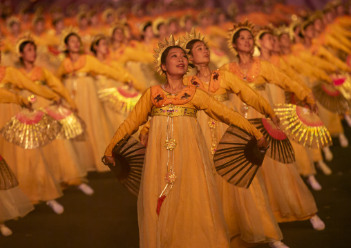 Women dancing in choson-ot during the Arirang mass games, DGC, Pyongyang, North Korea