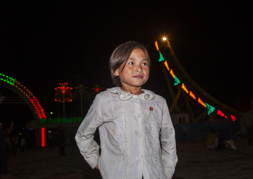 North Korean girl in the Kaeson youth park at night, DGC, Pyongyang, North Korea