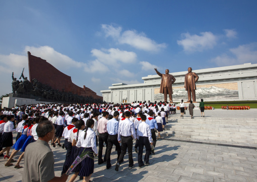 Pioneers from the Korean children's union in the Grand monument, DGC, Pyongyang, North Korea