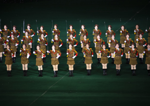 North Korean women dressed as soldiers dancing with swords during Arirang, DGC, Pyongyang, North Korea