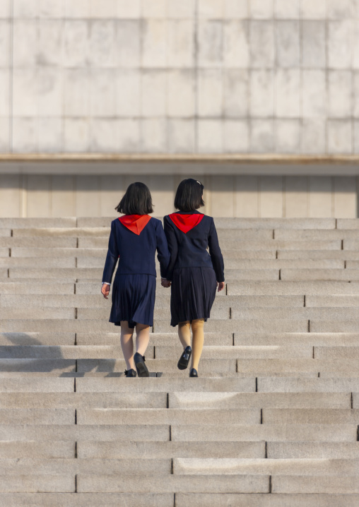 North Korean pioneer girls in the street, DGC, Pyongyang, North Korea