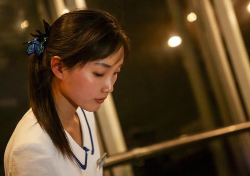 Portrait of a North Korean waitress in a restaurant, DGC, Pyongyang, North Korea