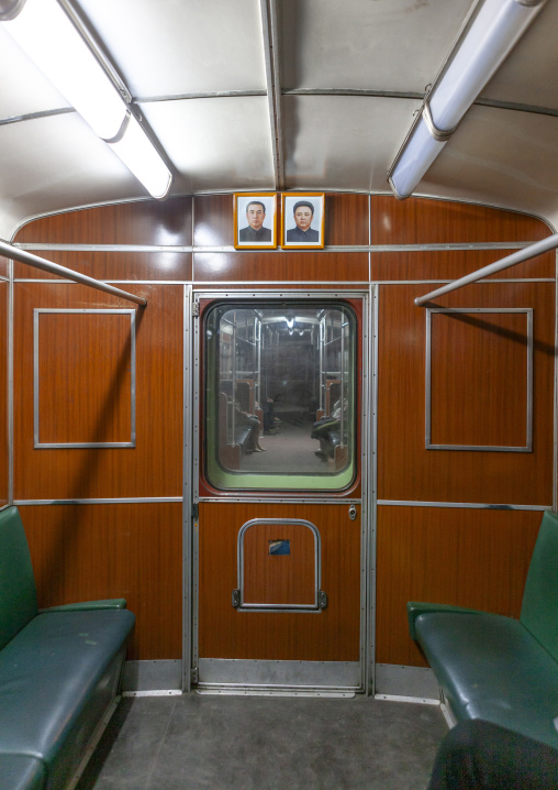 Official portraits of the Leaders in a subway wagon, DGC, Pyongyang, North Korea