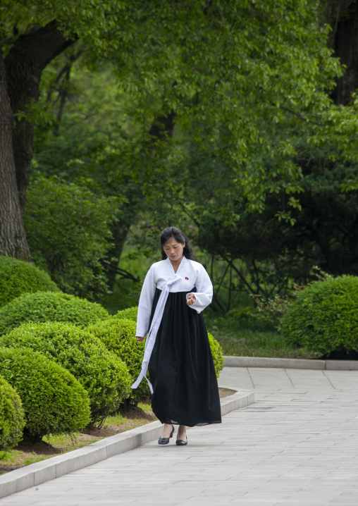 North Korean woman in traditional choson-ot in the street, DGC, Pyongyang, North Korea