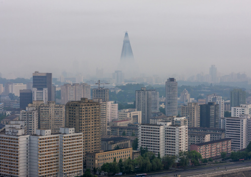 Foggy view across Taedong river from Yanggakdo hotel towards city centre, DGC, Pyongyang, North Korea