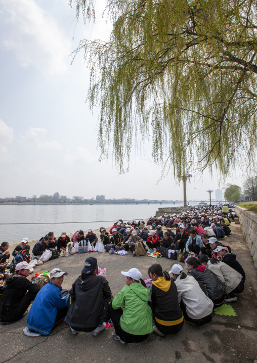 Young North Korean people resting after a mass games rehearsal, DGC, Pyongyang, North Korea