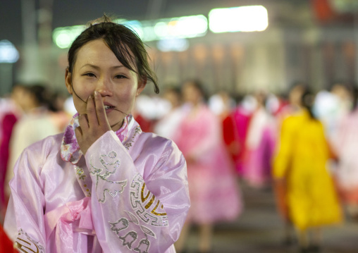 Women dancing to celebrate april 15 the birth anniversary of Kim Il-sung, DGC, Pyongyang, North Korea