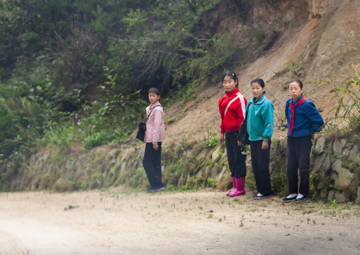 North Korean girls on a road, North Hamgyong, Jung Pyong Ri, North Korea