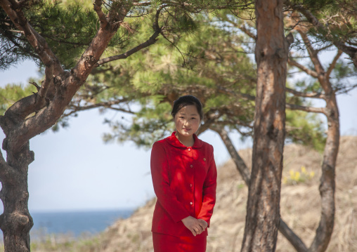 Portrait of a North Korean woman under trees, North Hamgyong, Chilbo Sea, North Korea