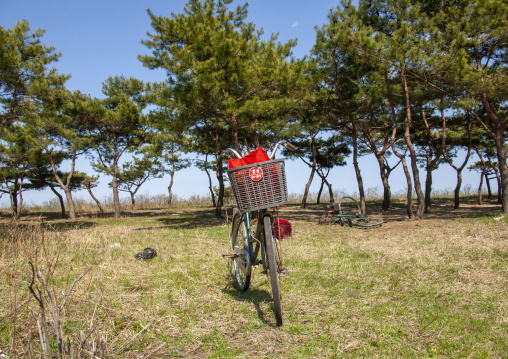 Bicycle parked on the beach, North Hamgyong, Chilbo Sea, North Korea