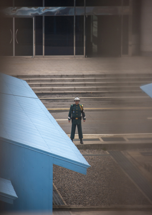 South Korean soldier standing on the demarcation line in the DMZ, North Hwanghae, Panmunjom, North Korea