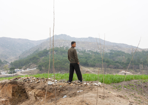 North Korean man in the countryside, North Hwanghae, Kaesong, North Korea
