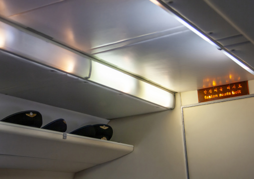 North Korean military caps in an air Koryo plane, Ryanggang, Samjiyon, North Korea
