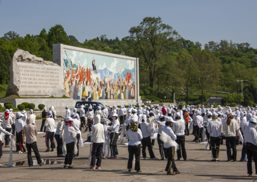 Young women in a mass games rehearsal in Kim il Sung square, DGC, Pyongyang, North Korea