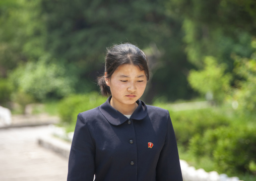 Portrait of a North Korean young woman in the street, North Hwanghae, Kaesong, North Korea