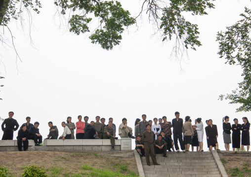 North Korean people waiting in the street, DGC, Pyongyang, North Korea