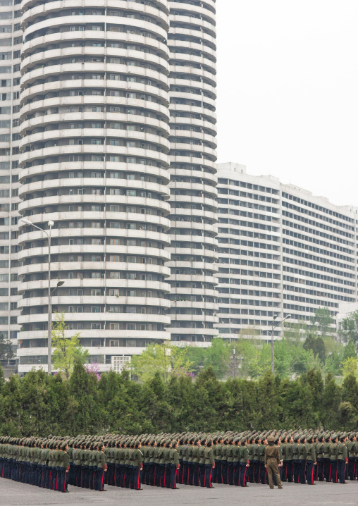 North Korean women military parade in the street in front of buildings, DGC, Pyongyang, North Korea