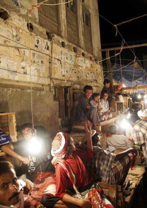 Qat sellers at night market, Al Hudaydah Governorate, Hodeidah, Yemen
