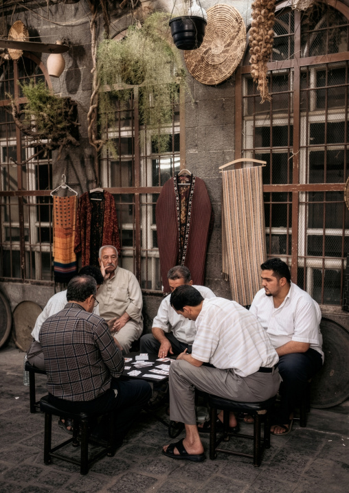 Men playing cards in the streets, Rif Dimashq, Damascus, Syria