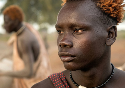 Mundari tribe man with hair dyed in orange with cow urine, Central Equatoria, Terekeka, South Sudan