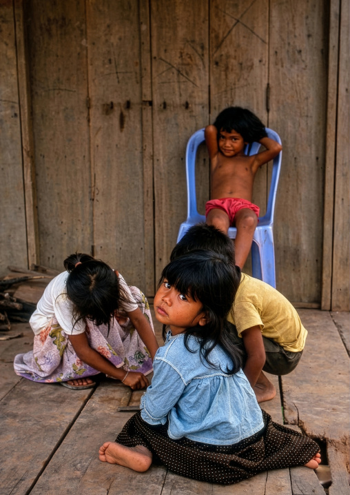 Cambodian children in the floating village on Tonle sap lake, Siem Reap Province, Chong Kneas, Cambodia