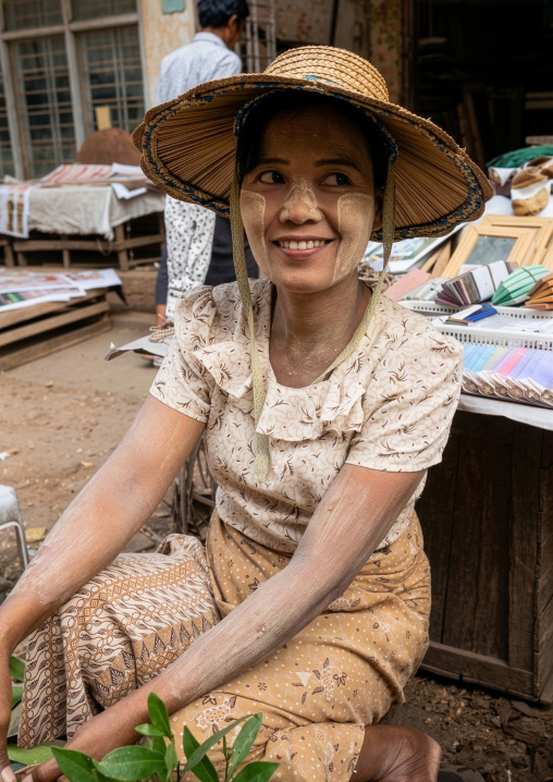 Portrait of a burmese woman with thanaka on the face, Yangon region, Yangon, Myanmar