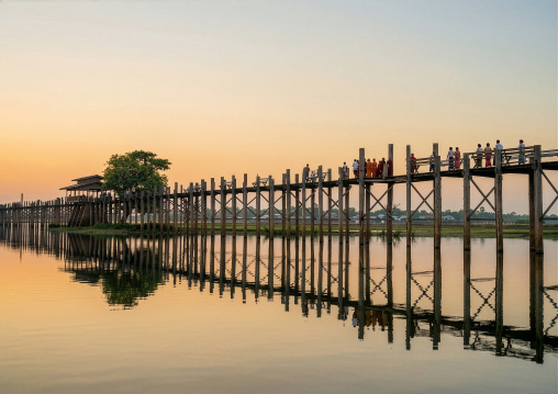 People crossing U Bein wooden bridge, Amarapura, Mandalay, Myanmar