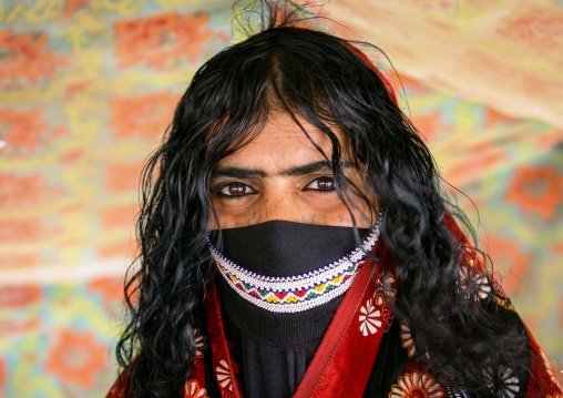 Portrait of a veiled Rashaida tribe woman with long hair, Northern Red Sea, Massawa, Eritrea