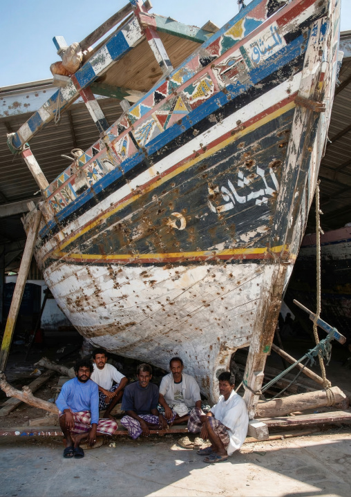 Yemeni sailors in front of a dhow, Al Hudaydah Governorate, Hodeidah, Yemen