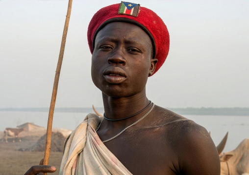 Mundari tribe man with an army beret, Central Equatoria, Terekeka, South Sudan