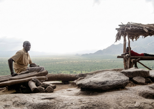 Lotuko tribe men resting, Central Equatoria, Illeu, South Sudan