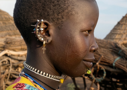 Toposa tribe young womanwith earrings, Namorunyang State, Kapoeta, South Sudan