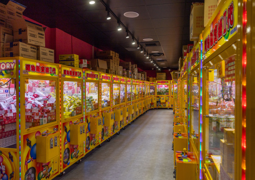 Claw machines with toys at a game arcade, Ximending district, Taipei, Taiwan