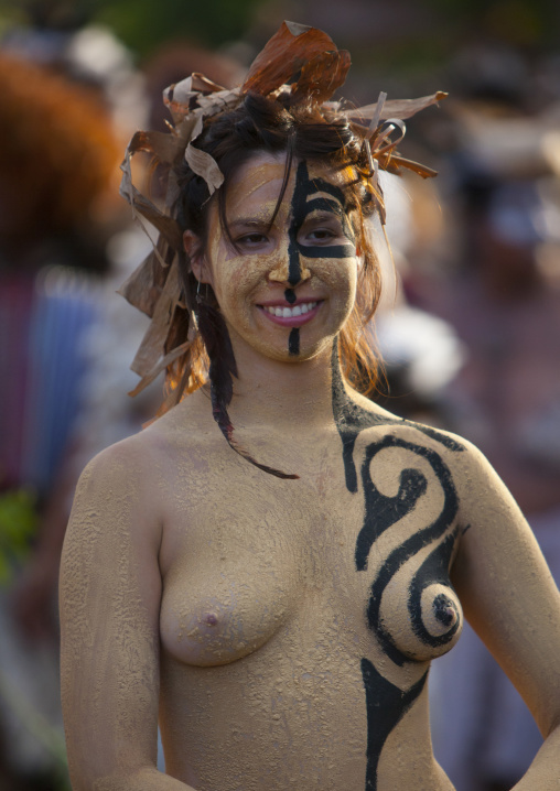 Body painted woman during carnival parade for Tapati festival, Easter Island, Hanga Roa, Chile