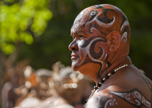 Man with traditional make up during tapati festival, Easter Island, Hanga Roa, Chile