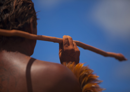 Back of a native man during spear competition at Tapati festival, Easter Island, Hanga Roa, Chile