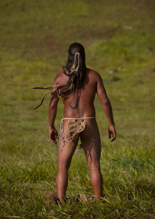 Man during haka pei competition during tapati festival, Easter Island, Hanga Roa, Chile