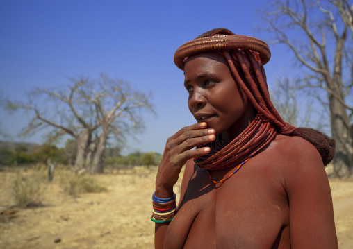 Himba Woman In Front Of A Baobab Tree, Angola