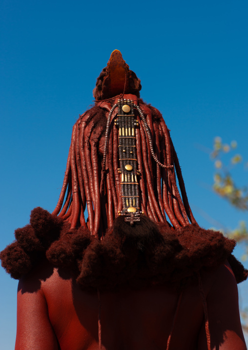 Rear view of a Himba tribe woman, Cunene Province, Oncocua, Angola
