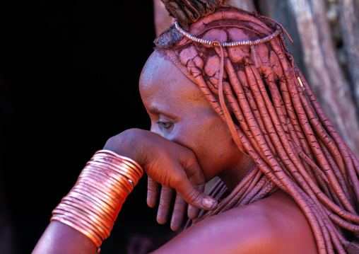 Portrait of a Himba tribe woman wearing bracelets, Cunene Province, Oncocua, Angola