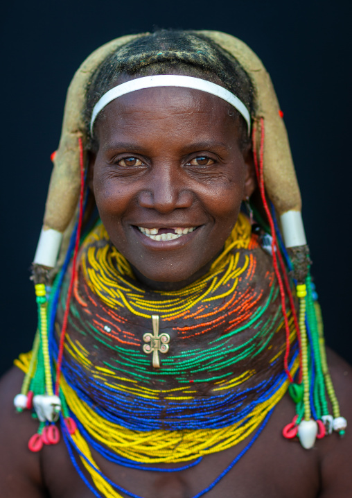 Portrait of a smiling Mumuhuila tribe woman, Huila Province, Chibia, Angola
