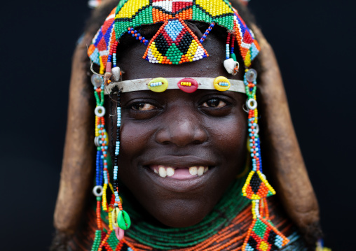 Portrait of a smiling Mumuhuila tribe woman, Huila Province, Chibia, Angola