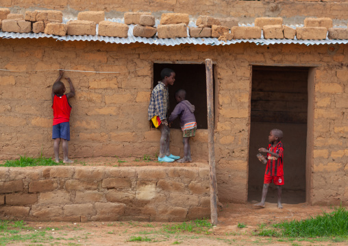 Angolan children playing in front of a house, Huila Province, Caconda, Angola