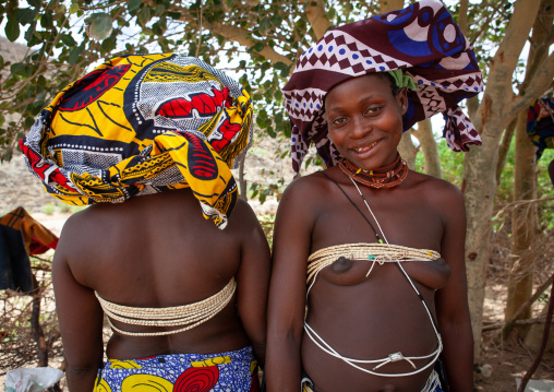 Mucubal tribe women wearing a colorful headwears, Namibe Province, Virei, Angola