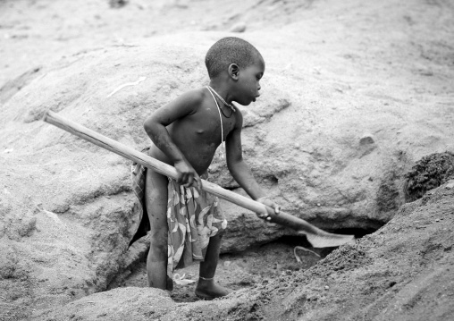 Mucubal Boy Digging With A Shovel To Find Water, Virie Area, Angola