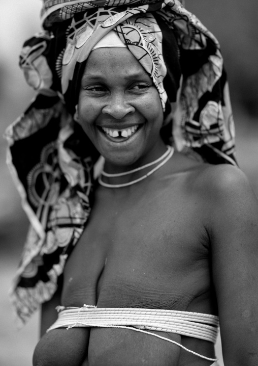 Smiling Mukubal Woman Wearing The Oyonduthi Bra And A Traditional Headscarf, Virie Area, Angola