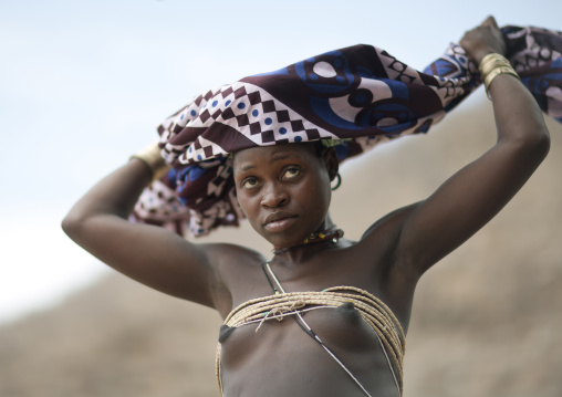 Mukubal Woman Putting On Her Ompota Headdress, Virie Area, Angola